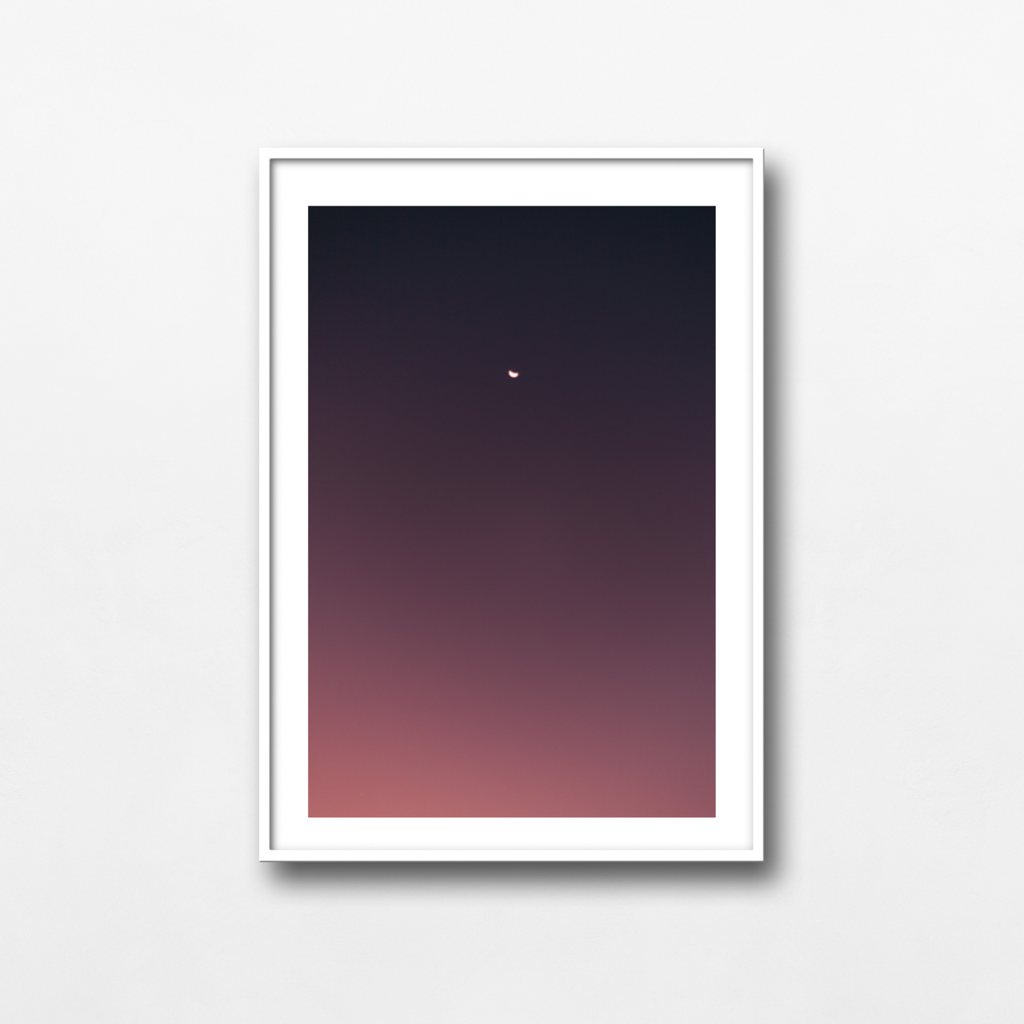 The pink sunset and the moon